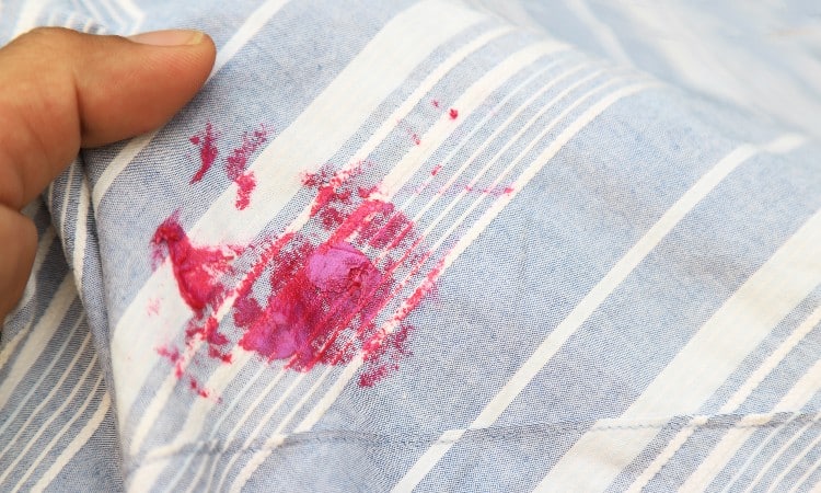 how to get red food coloring out of clothes